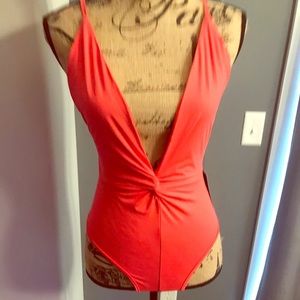 Pink one piece plunge swimsuit